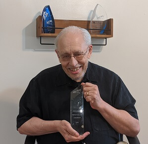 Rick Dobson proudly displaying his 2020 MSSQLTips.