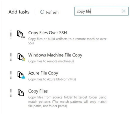 Copy output files from build directory to staging before archiving.